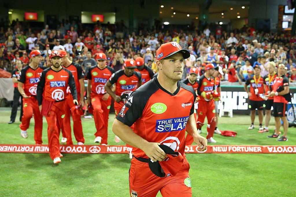 MELBOURNE, AUSTRALIA - DECEMBER 30: Aaron Finch, captain of the Renegades leads his team onto the field during the Big Bash League match between the Melbourne Renegades and the Perth Scorchers at Etihad Stadium on December 30, 2015 in Melbourne, Australia. (Photo by Scott Barbour/Getty Images)