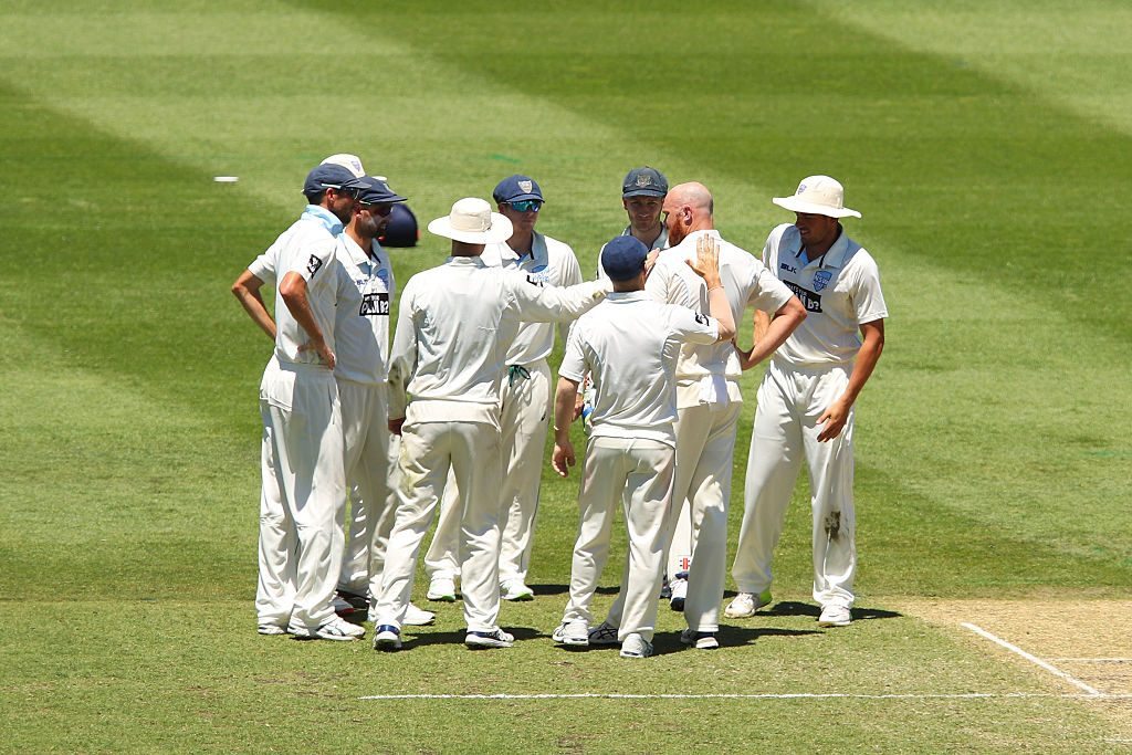 SYDNEY, AUSTRALIA - NOVEMBER 18:  Doug Bollinger of the Blues celebrates with team mates after claiming the wicket of Glenn Maxwell of the Bushrangers during day two of the Sheffield Shield match between New South Wales and Victoria at Sydney Cricket Ground on November 18, 2016 in Sydney, Australia.  (Photo by Brendon Thorne/Getty Images)